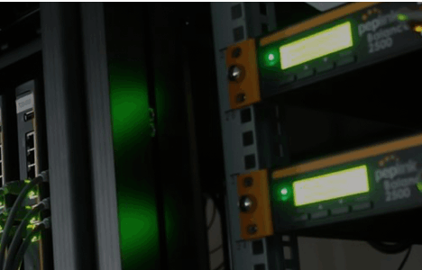 Picture of a data center rack with Peplink Balance device